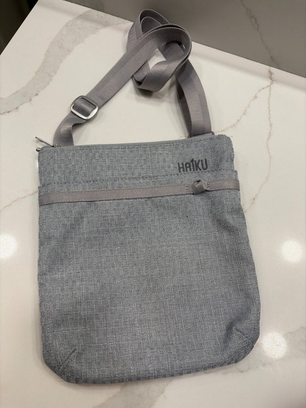 Haiku Revel Grey Crossbody Bag Eco-Friendly Travel RFID Blocking